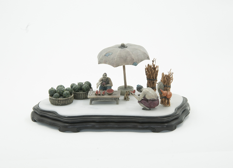 5《瓜摊》青田石18x9cm.jpg